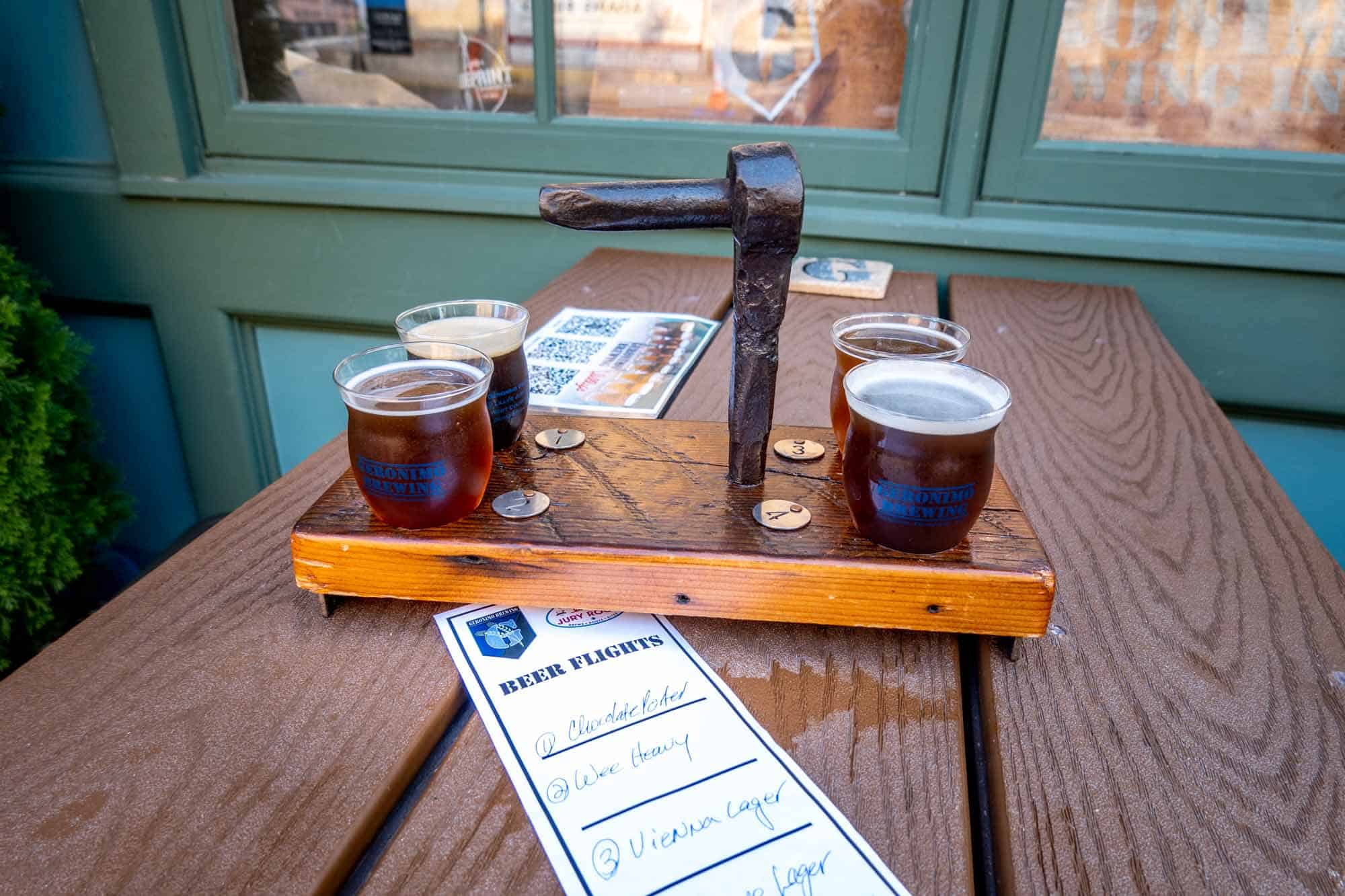 Beer flight on picnic table