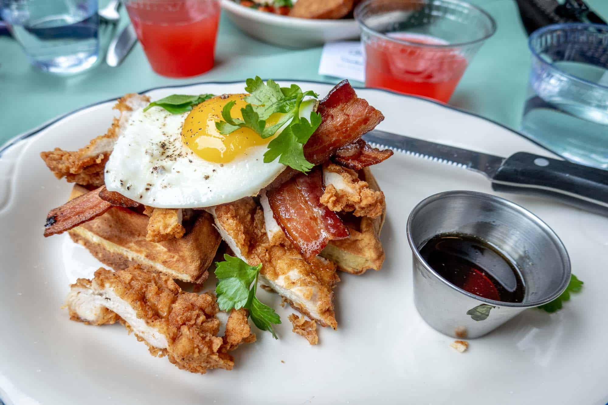 Egg on fried chicken & waffles