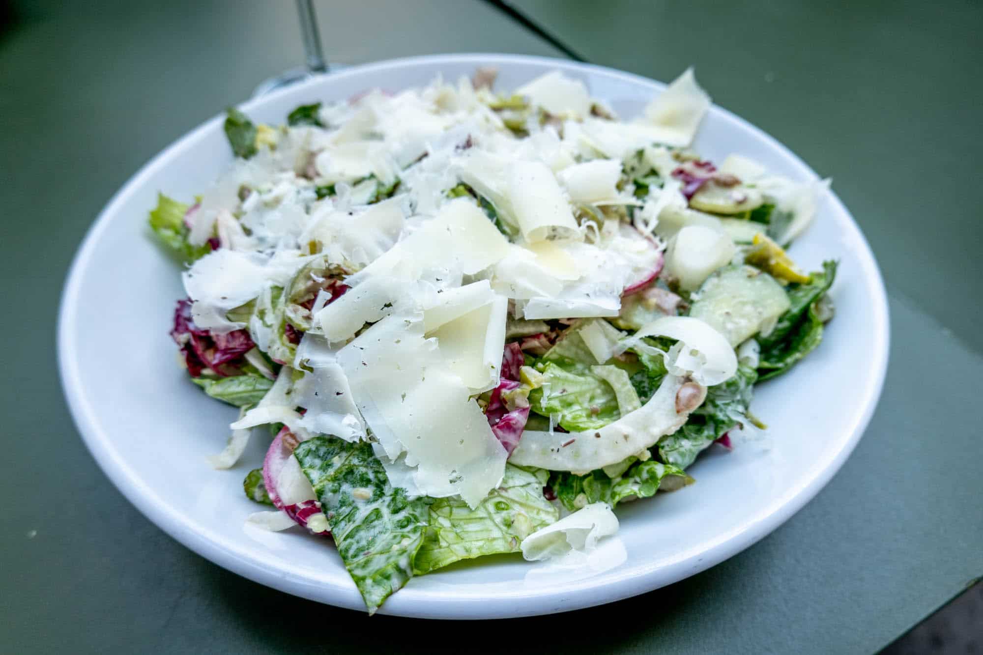 Caesar salad with shaved cheese