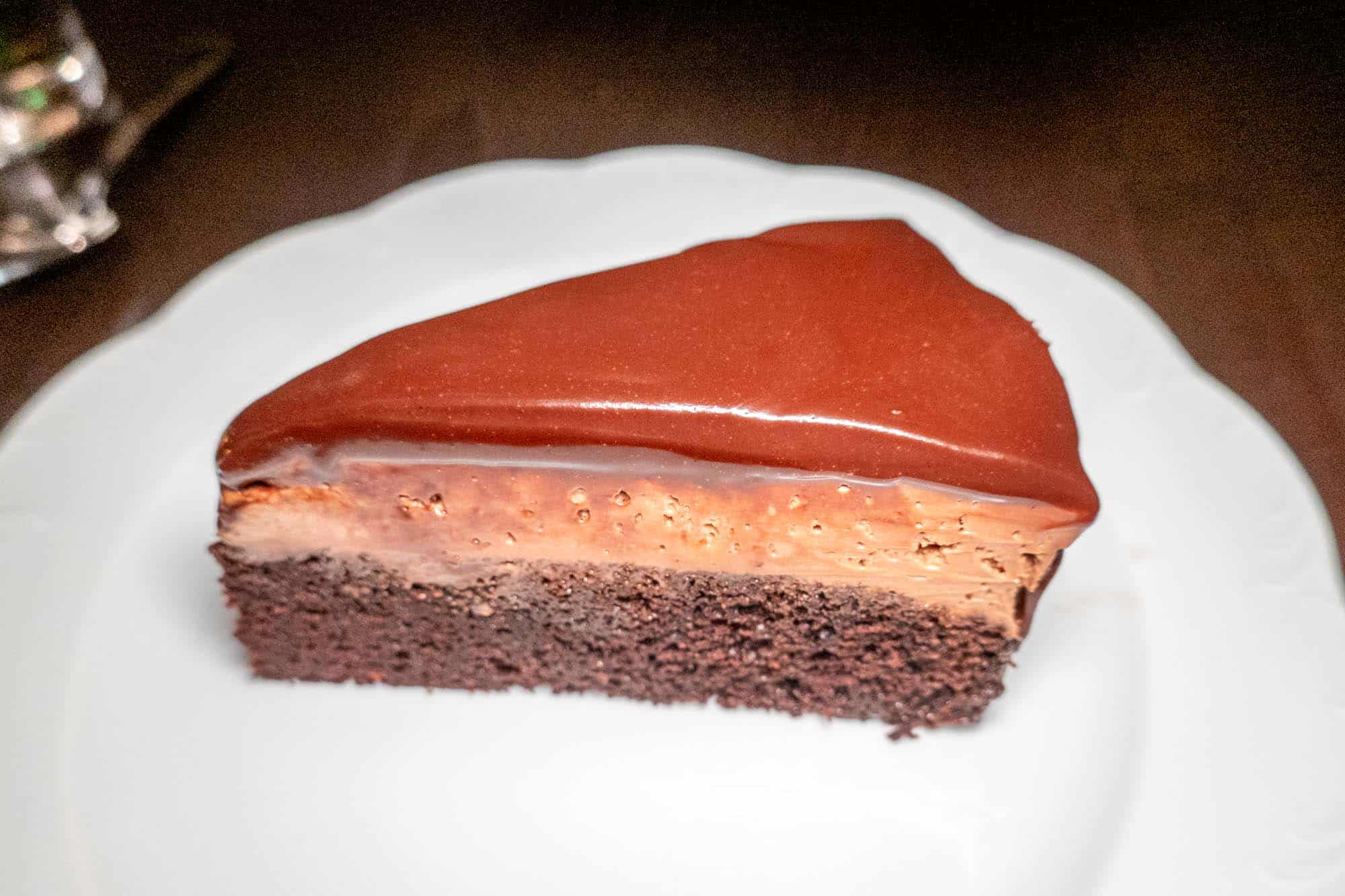 Chocolate cake on white plate