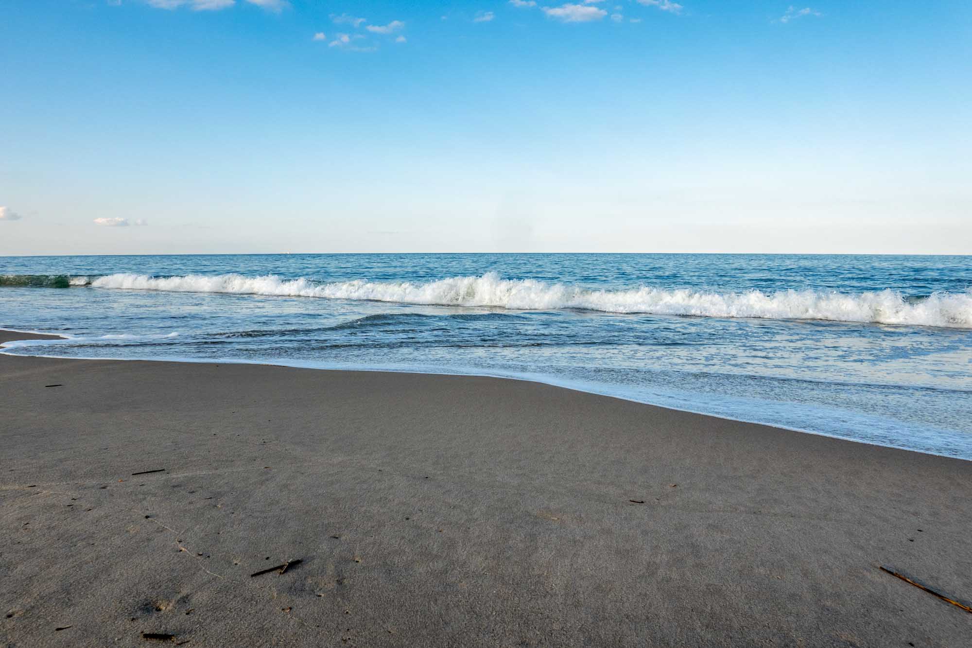 Ocean waves hitting the sand