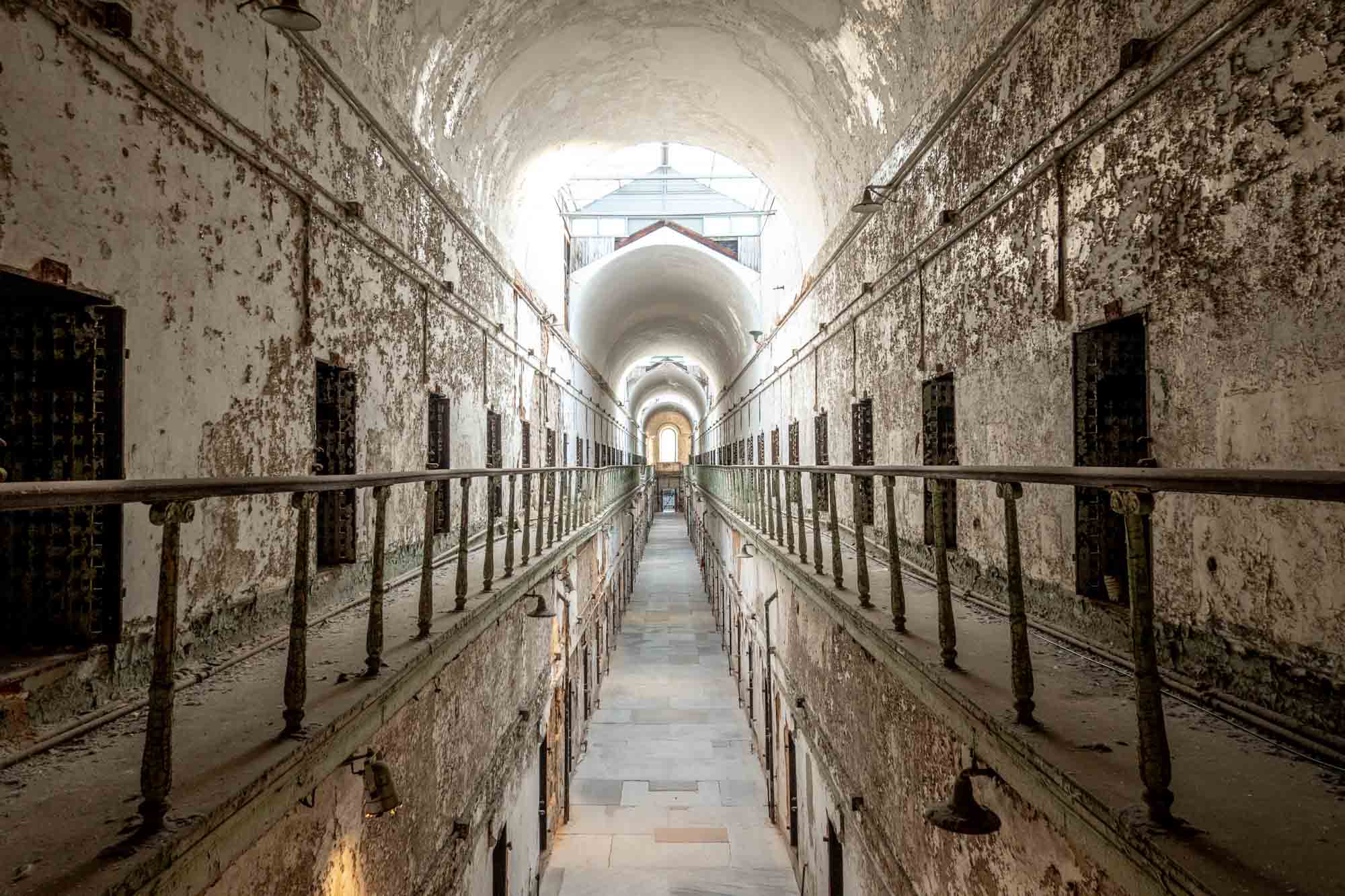 Cell block of Eastern State Penitentiary, an abandoned jail.