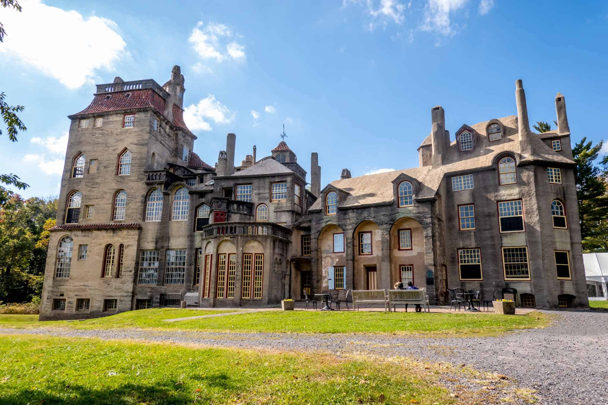 Exterior of a concrete, castle-like building.