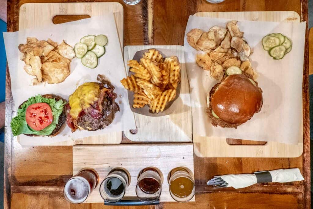 Burgers, French fries, and beer at a restaurant in Ambler
