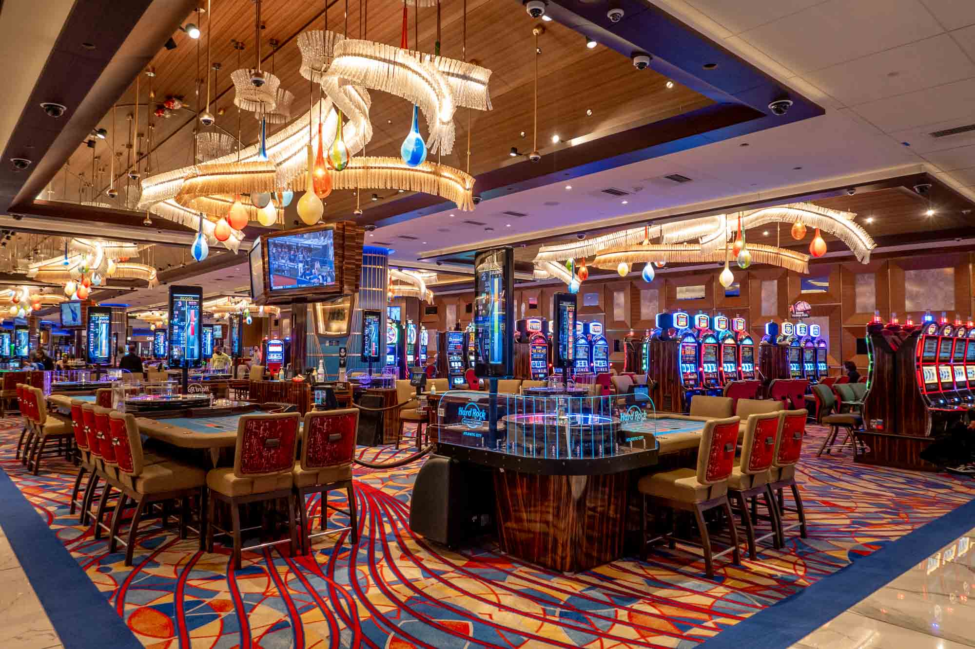 Table games and slot machines inside a casino.