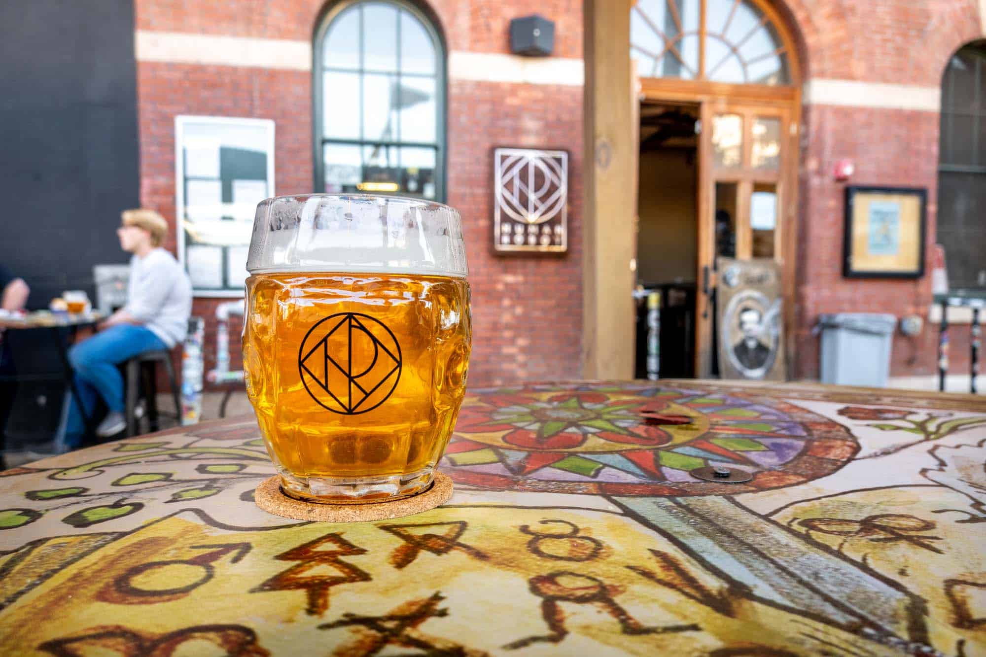 Pint of beer at Human Robot Brewery on table