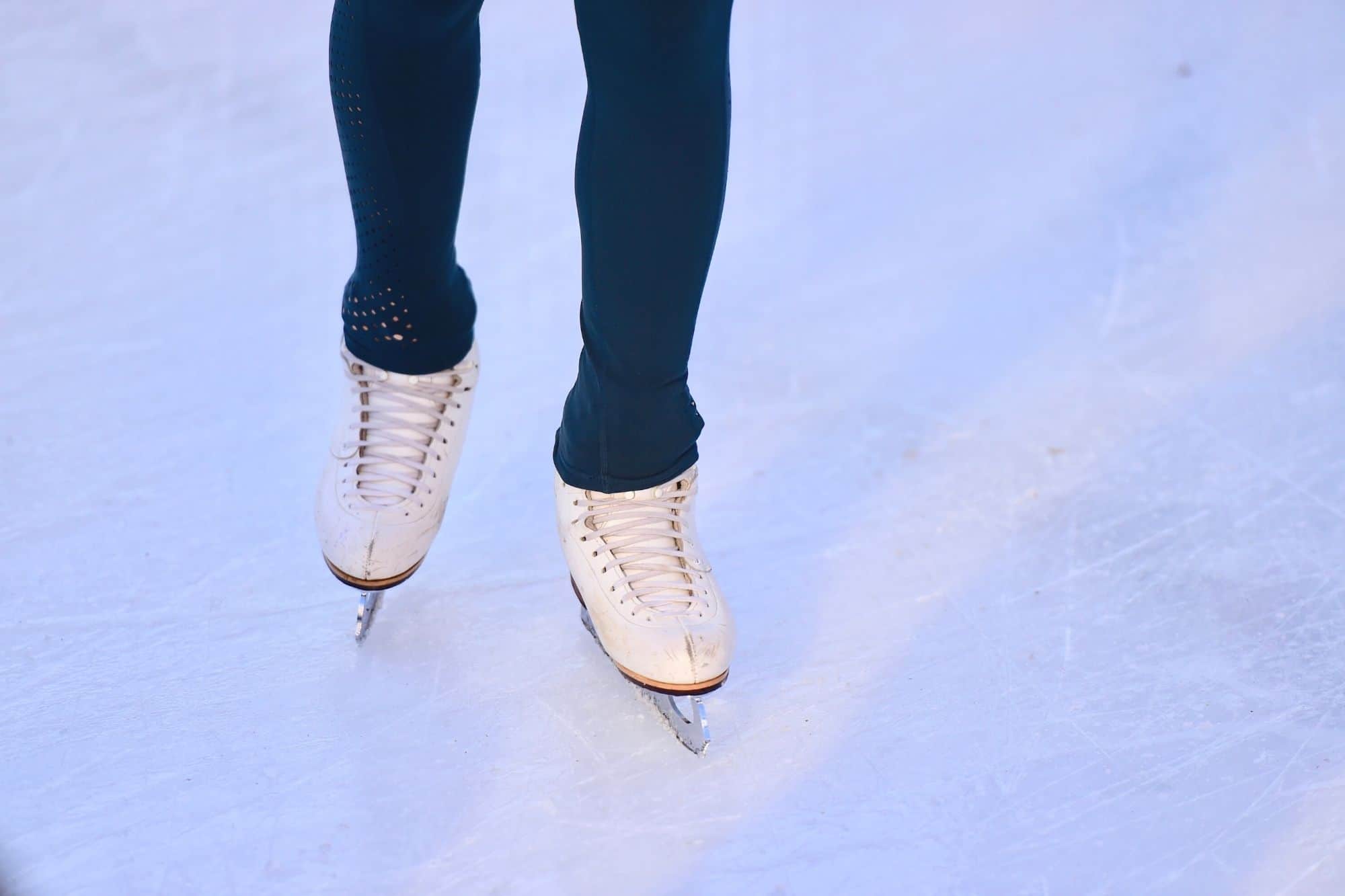 Girls skates on ice