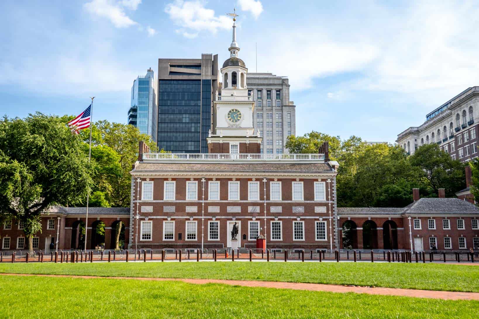 Brick building with a clock tower and cupola.