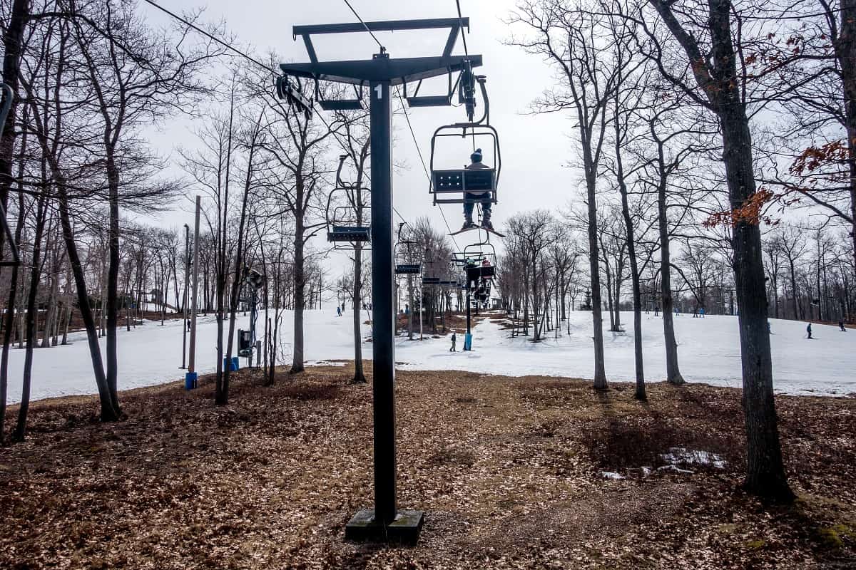 Ski lift and barren ground beneath