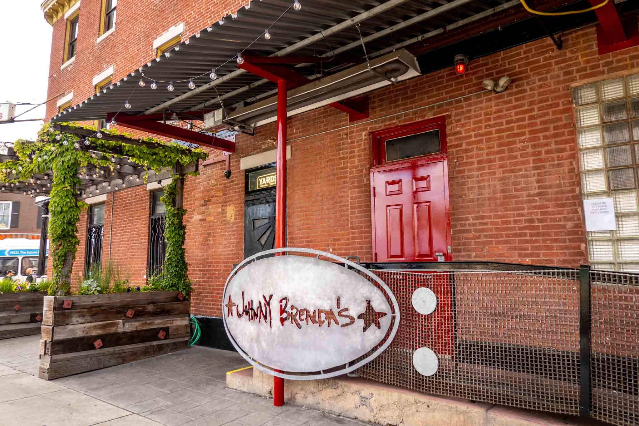 Exterior of Johnny Brenda's and sign