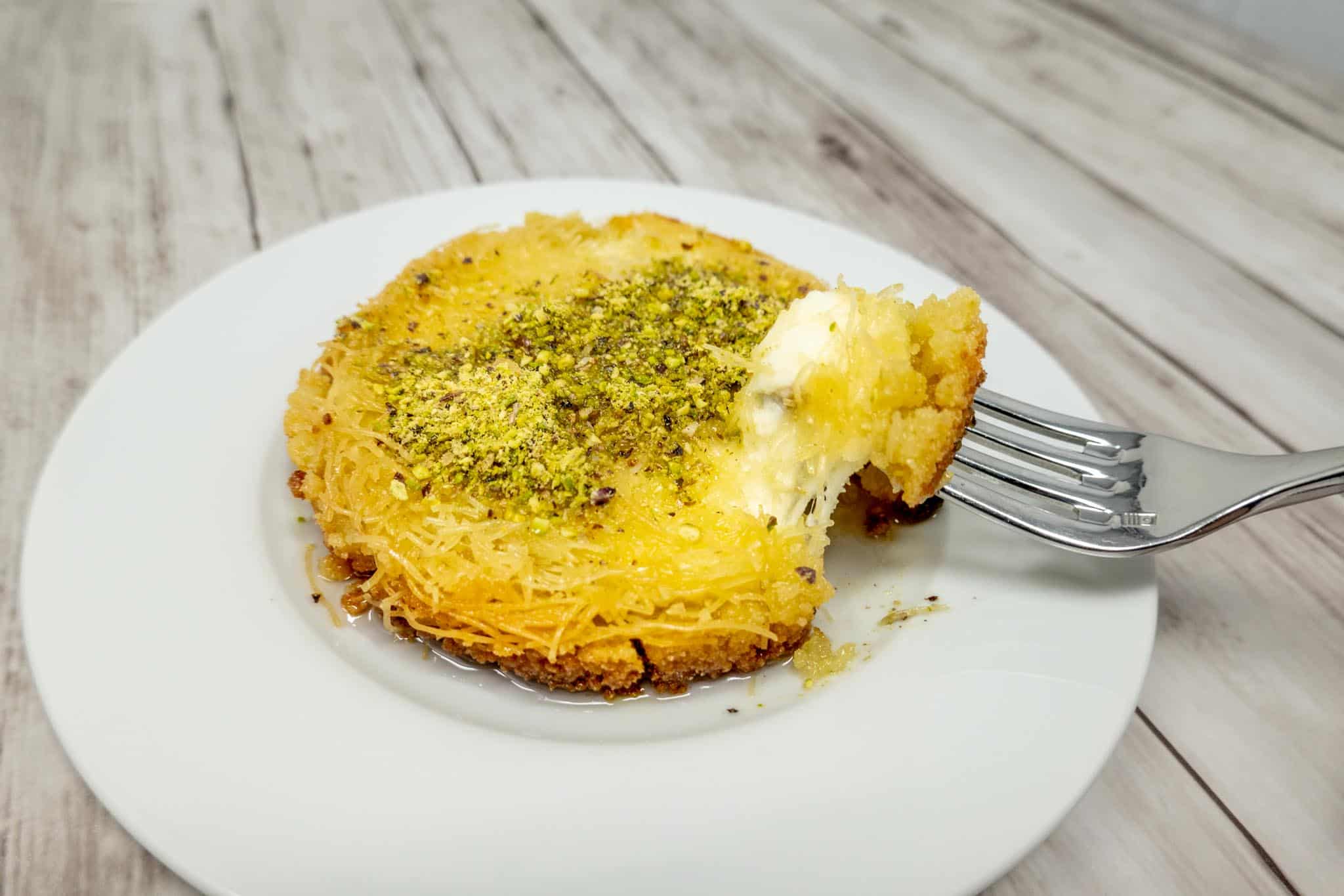 Cheese pastry with crumbled pistachios. 