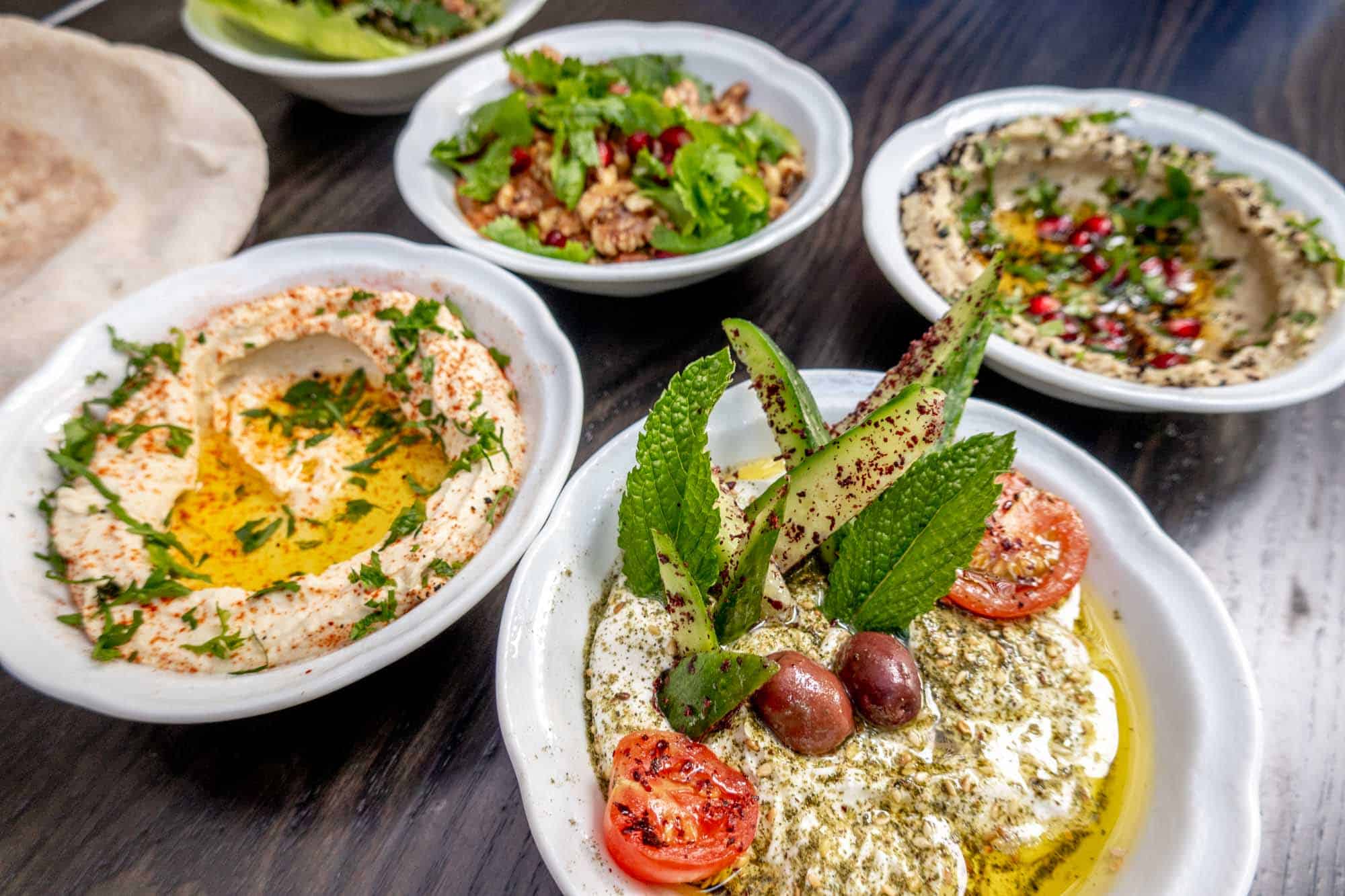 Mezze appetizers in small bowls