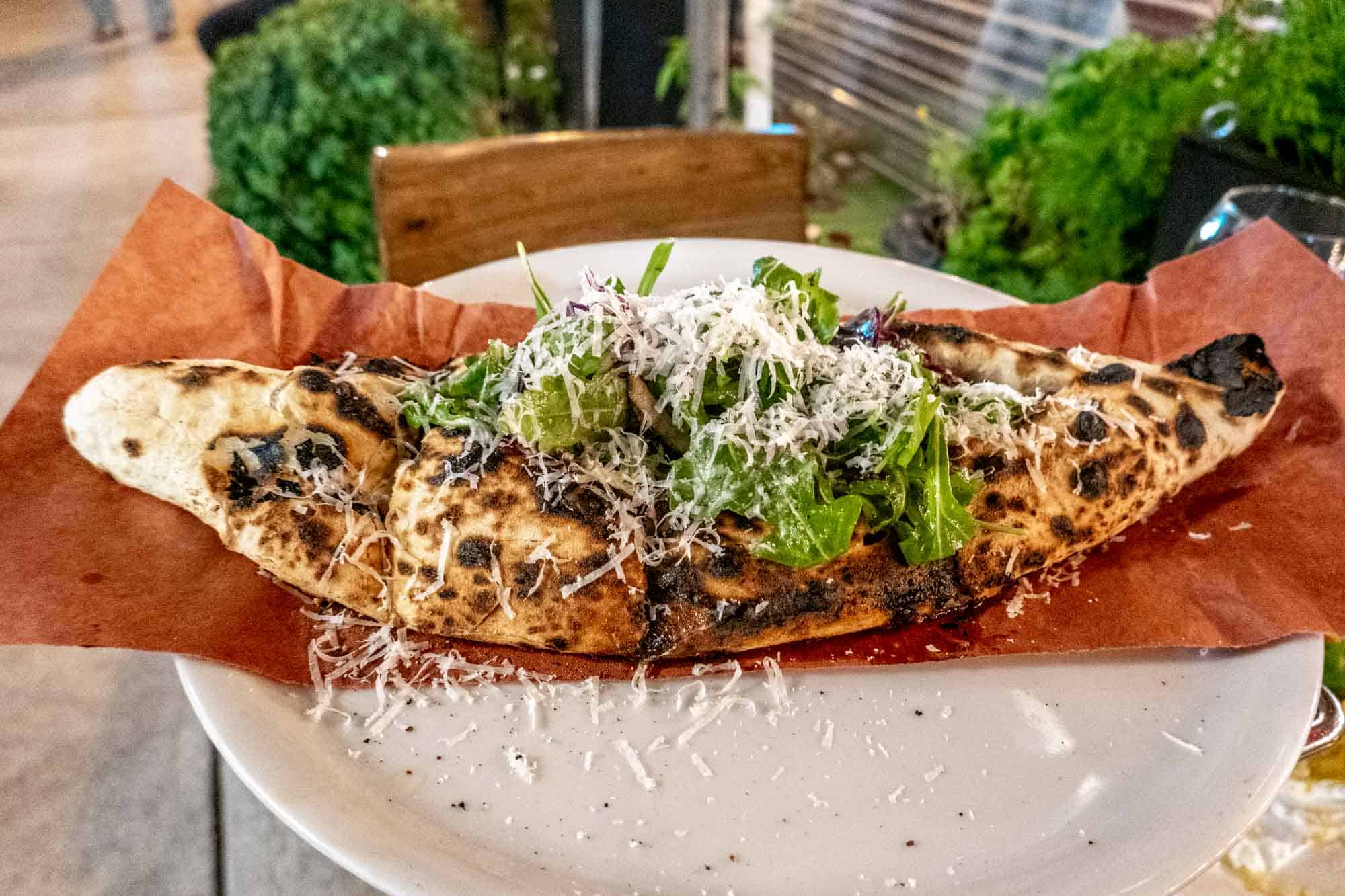 Mushroom pide with arugula at Stina Pizzeria