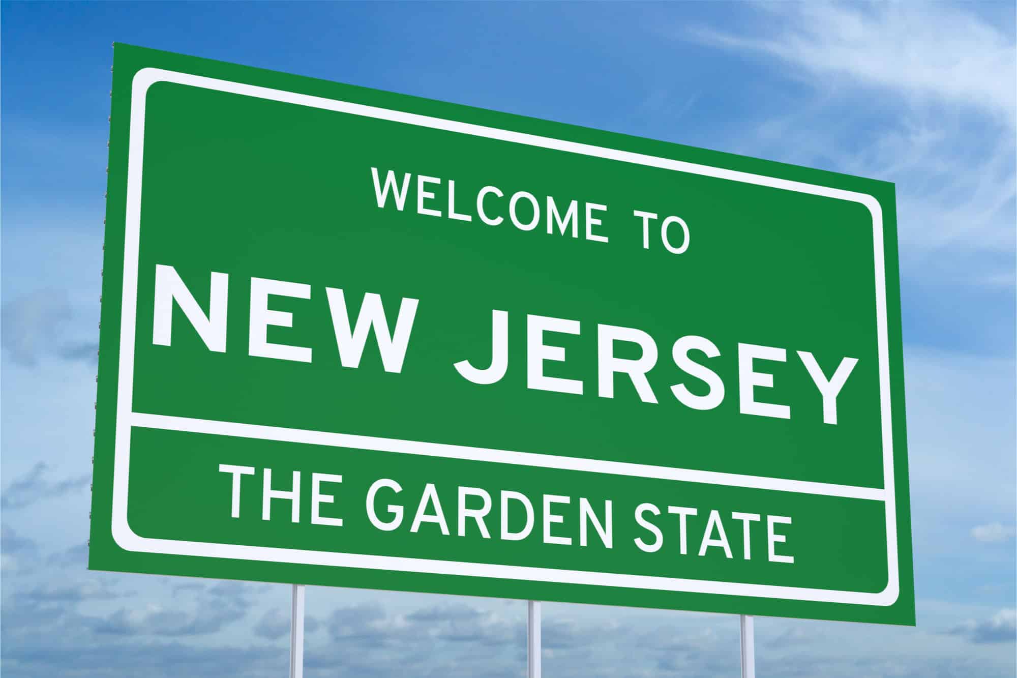Green sign saying Welcome to New Jersey, the Garden State