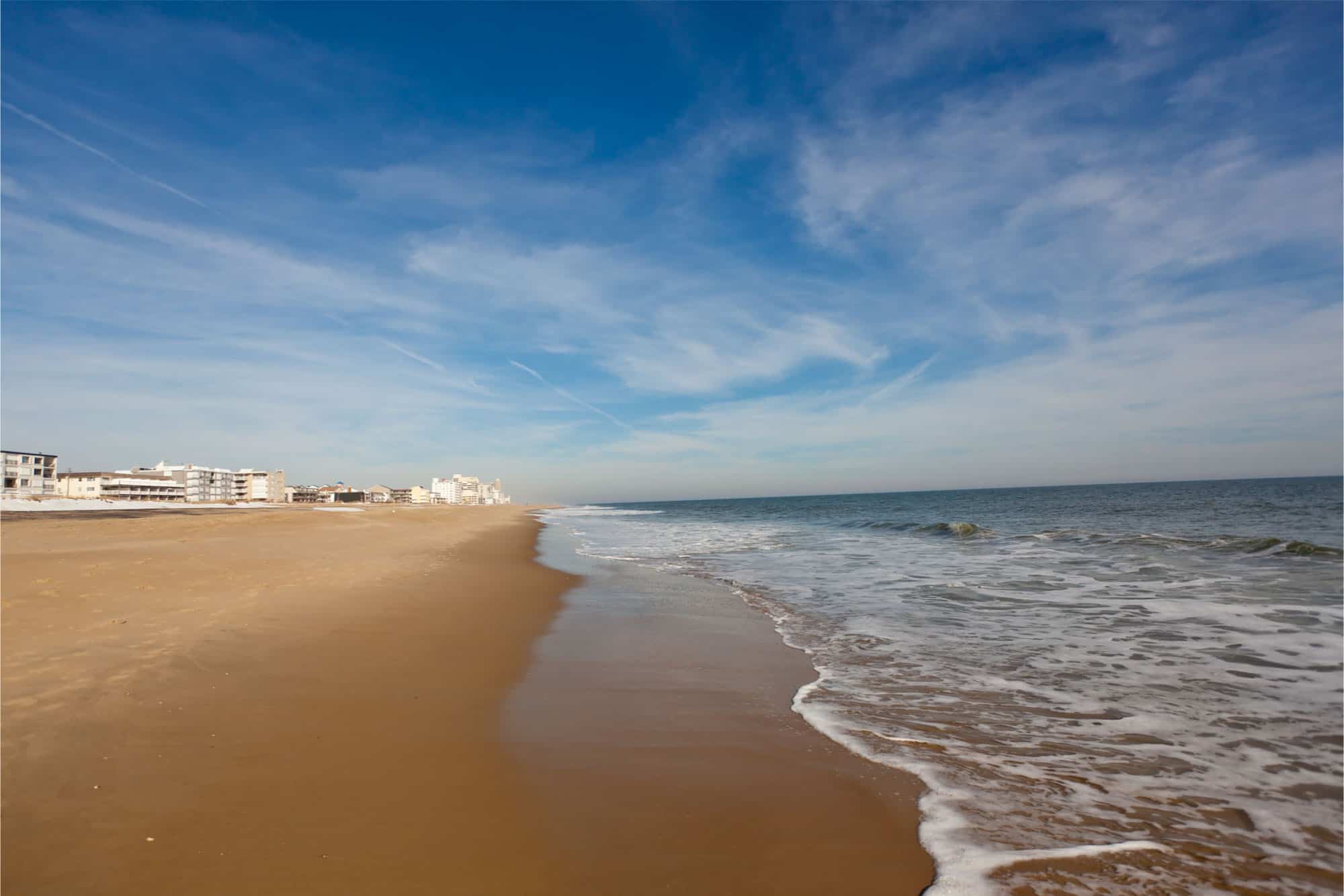 Hotels along sandy beach.