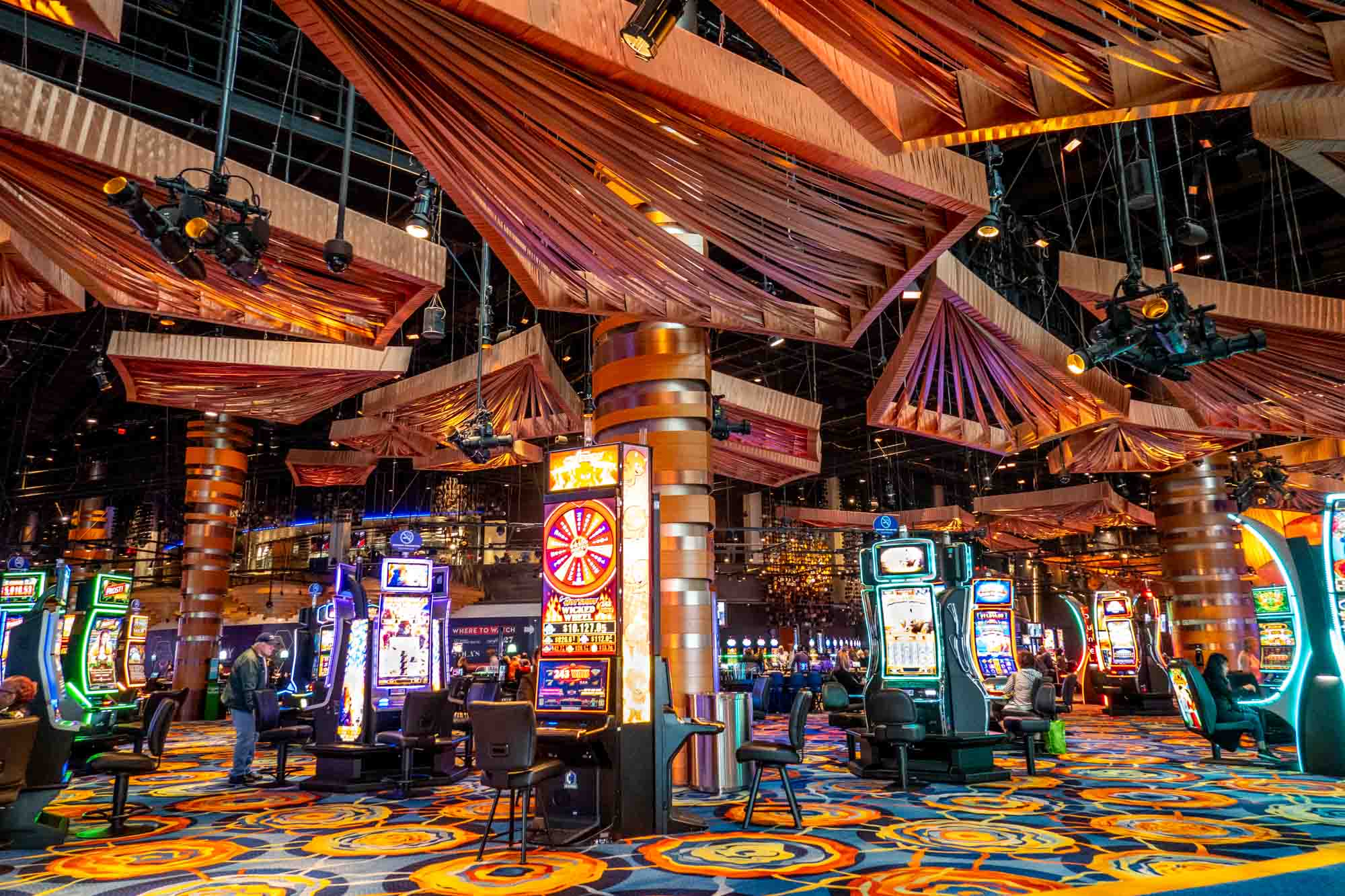 Video slots machines inside a brightly colored casino