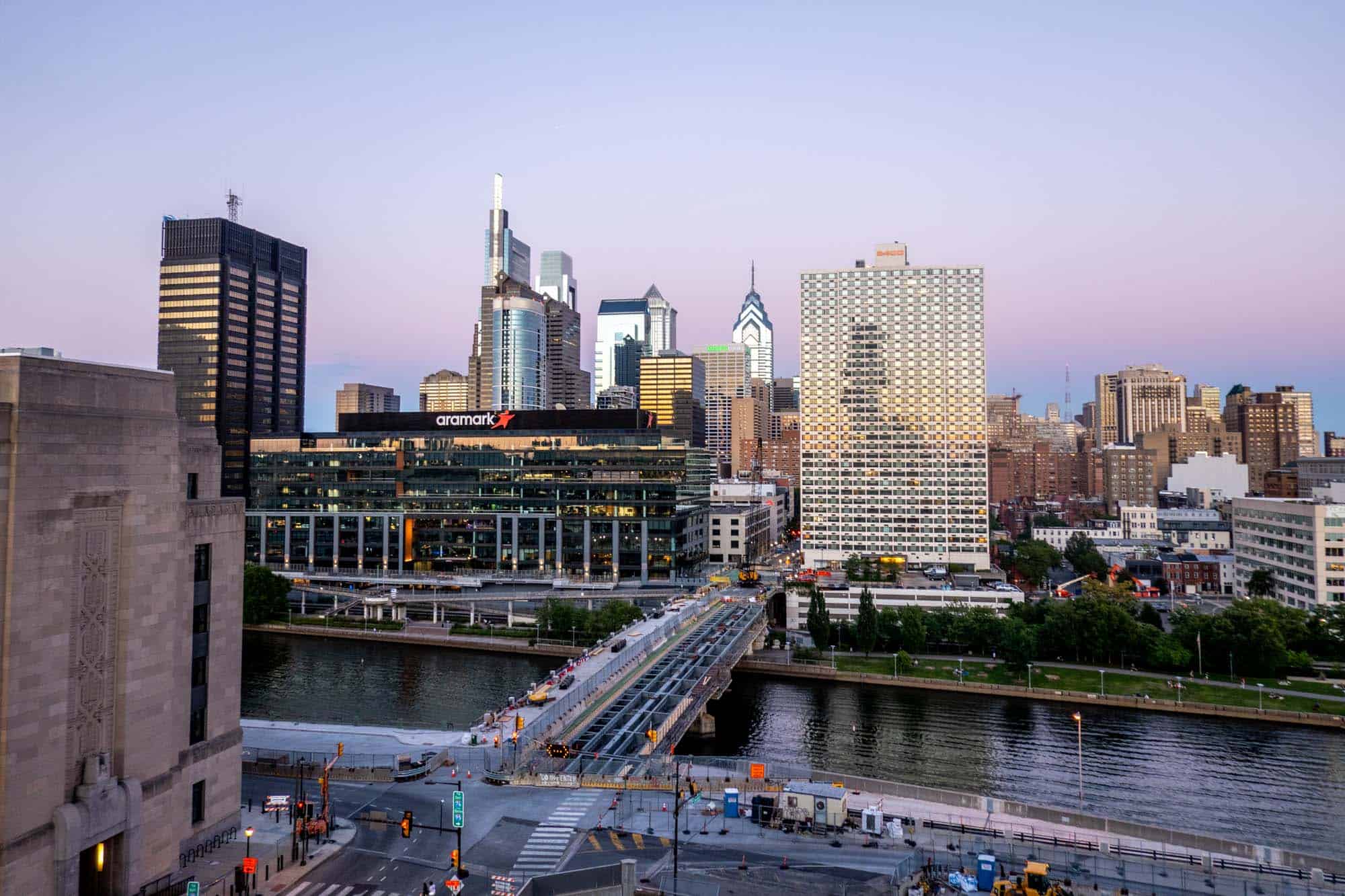 Skyline view of buildings at sunset.