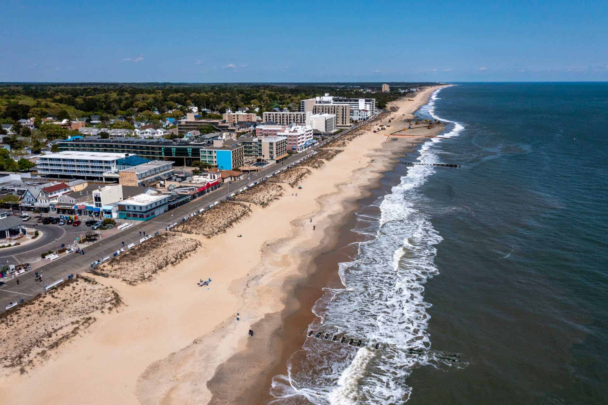 Overhead view of a coastal town, beach, and ocean
