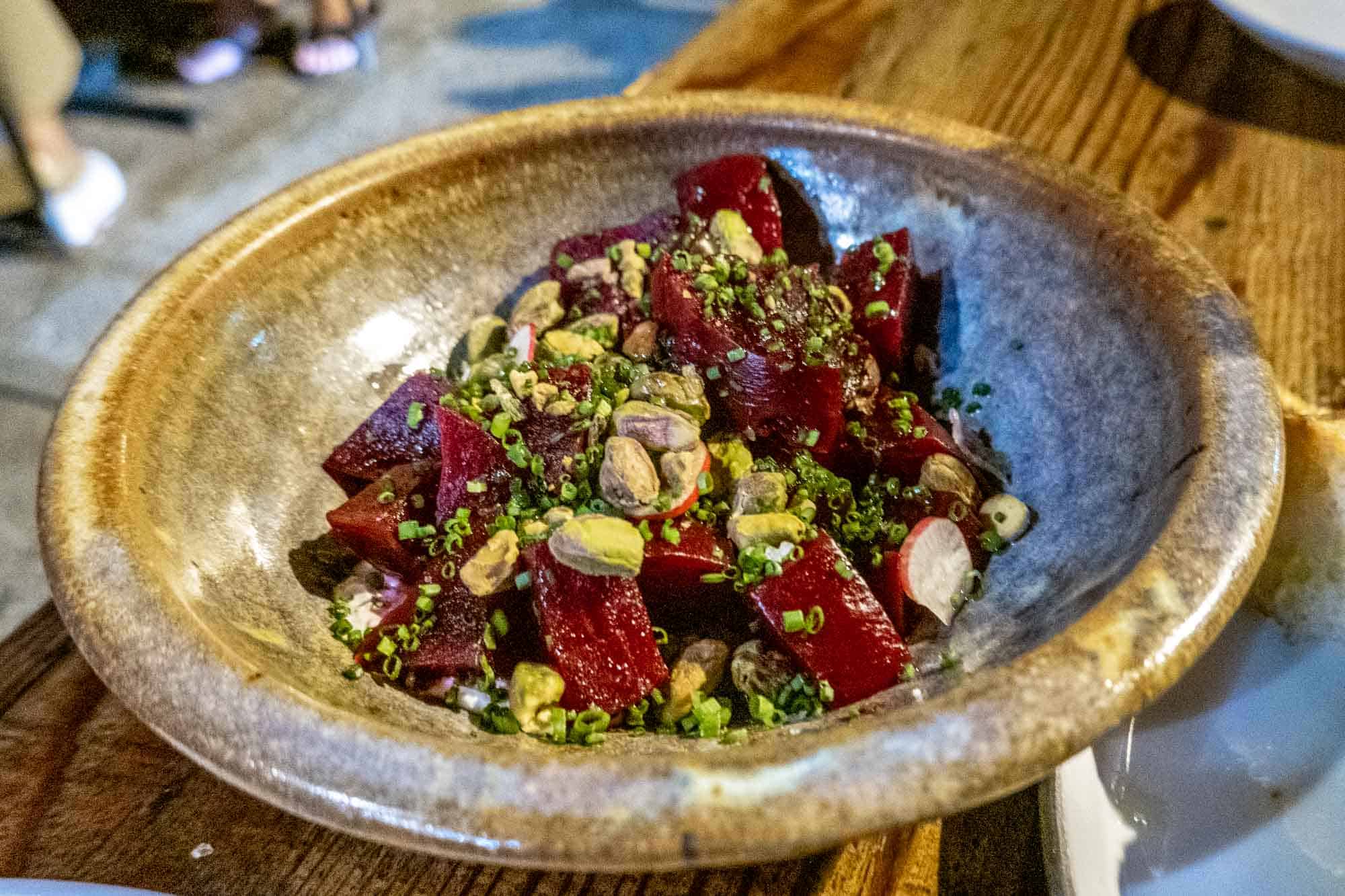 Roasted beets and pistachios in bowl