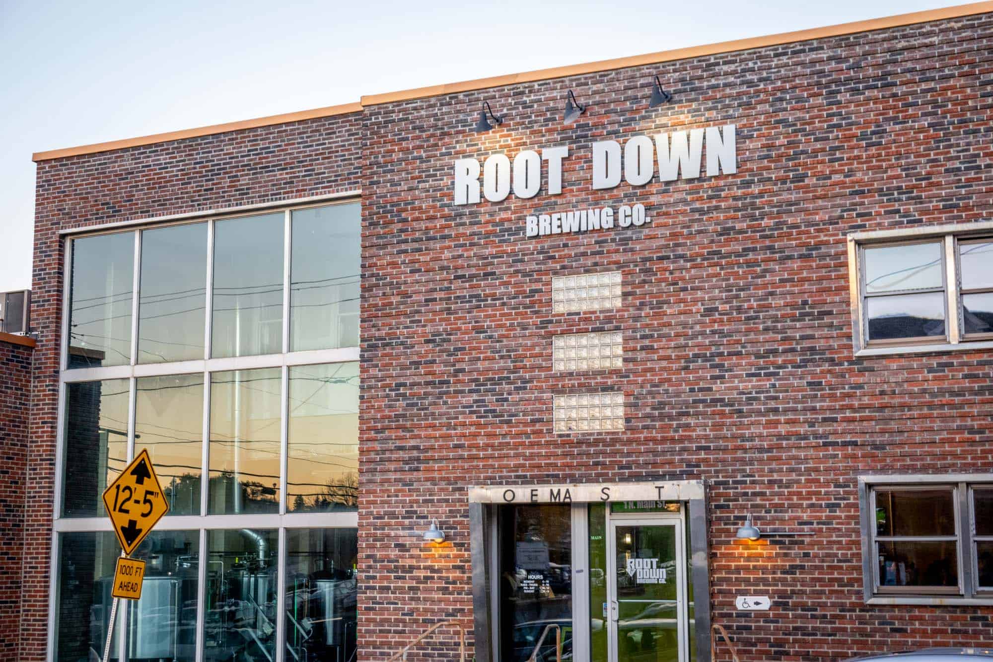 Red brick exterior of Root Down Brewing Co.