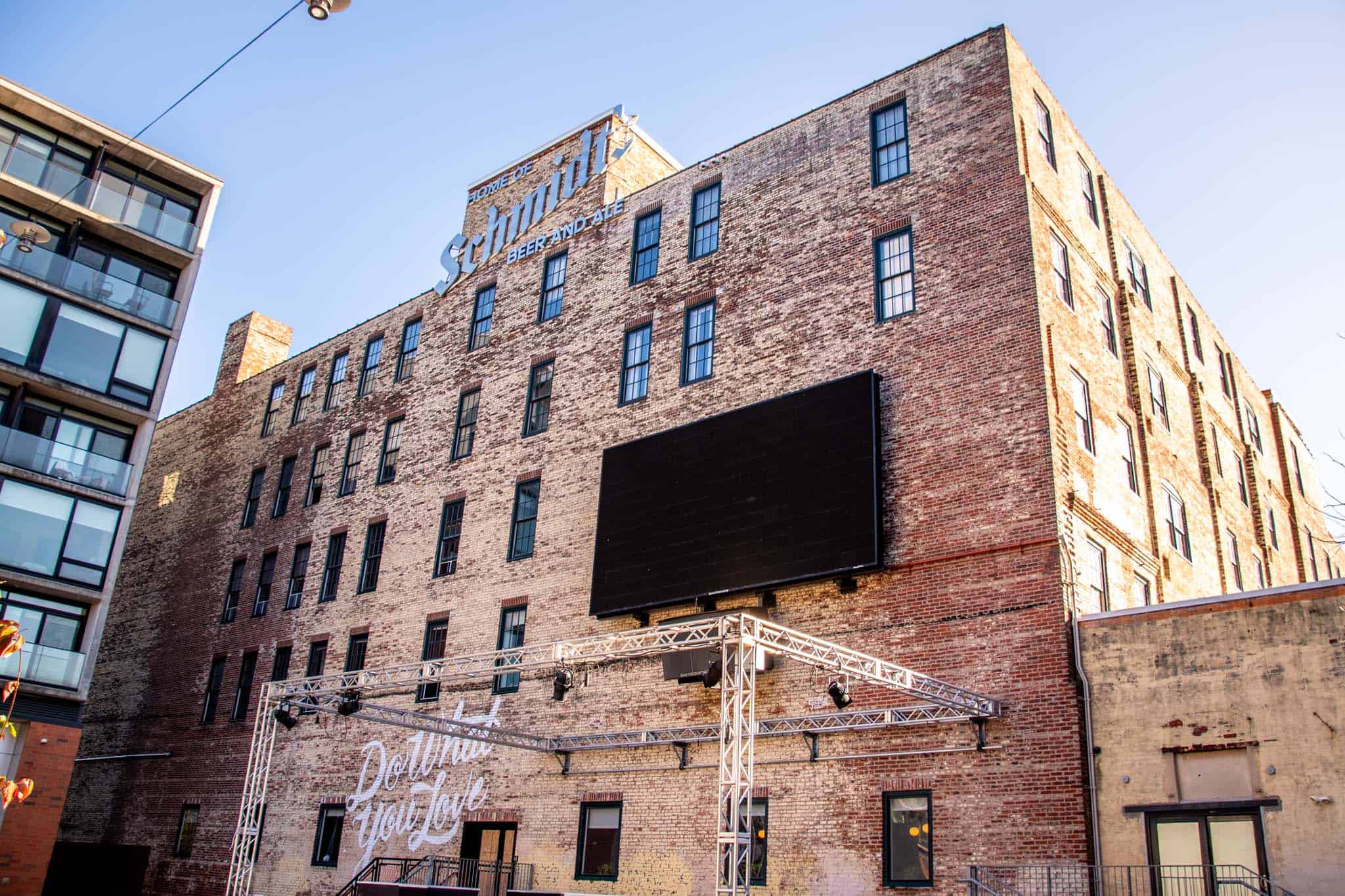 Large brick building with sign: Home of Schmidt Beer and Ale 