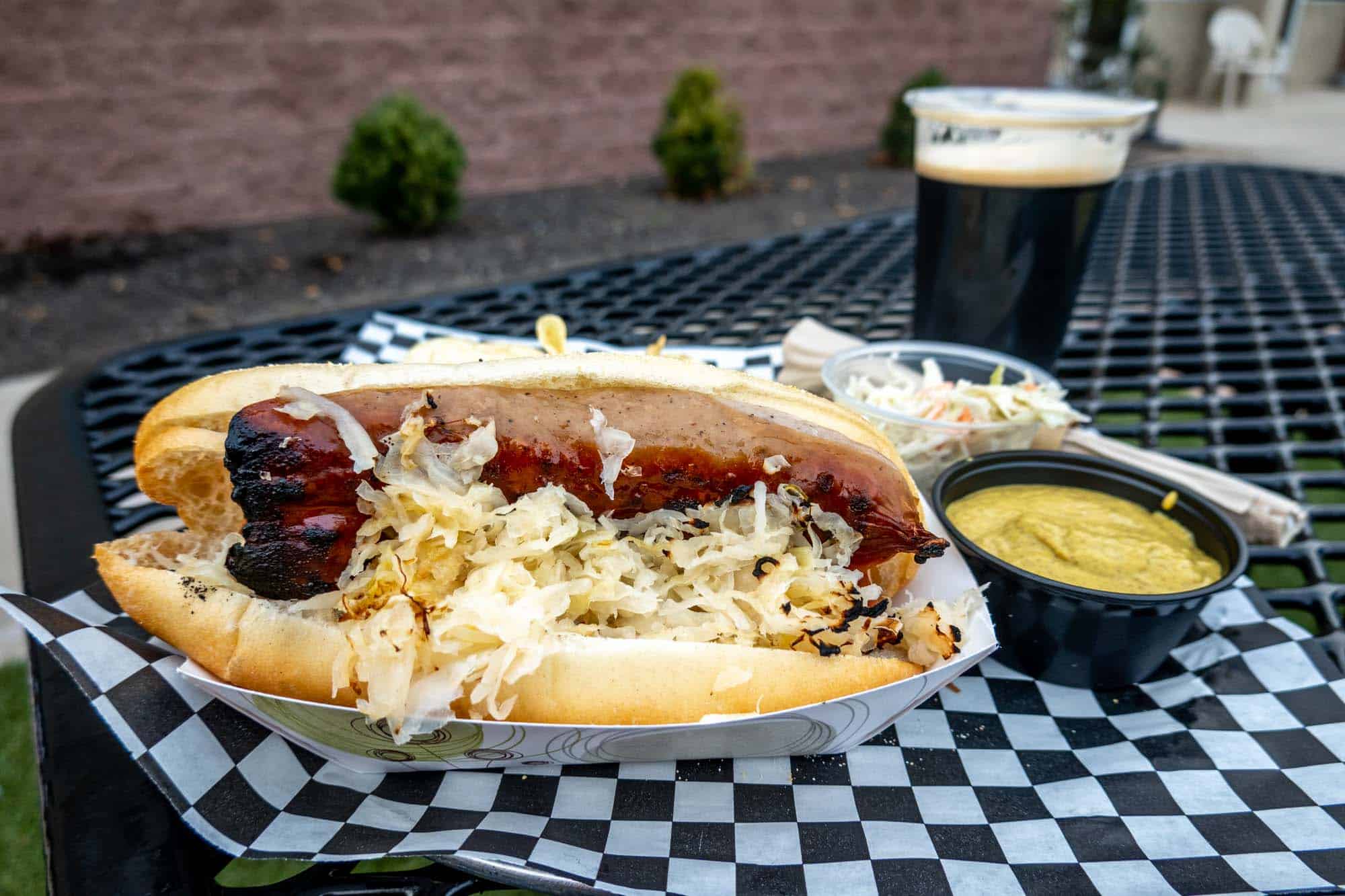 Bratwurst with sauerkraut with a beer