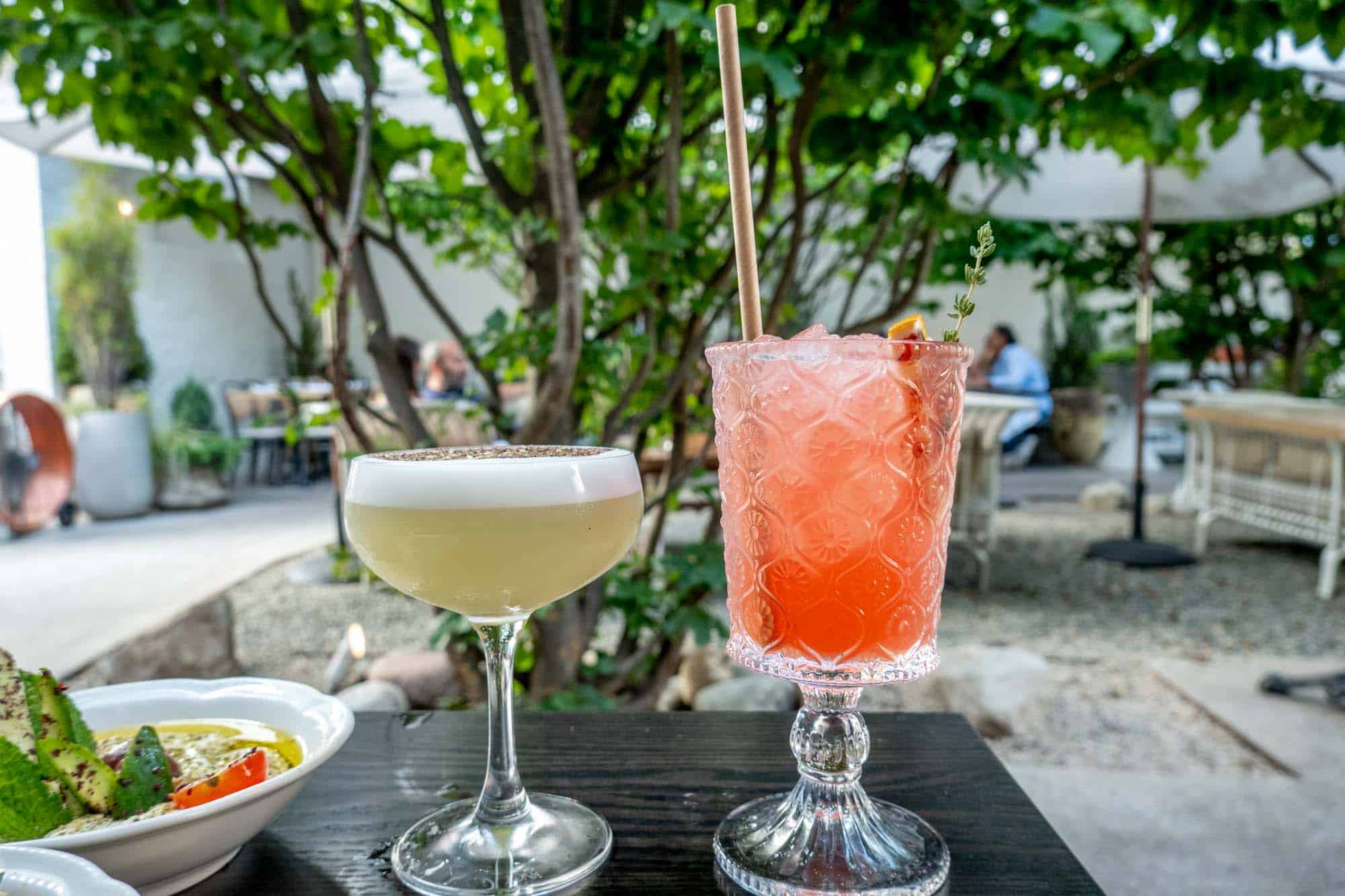 Cocktails on a table in a garden