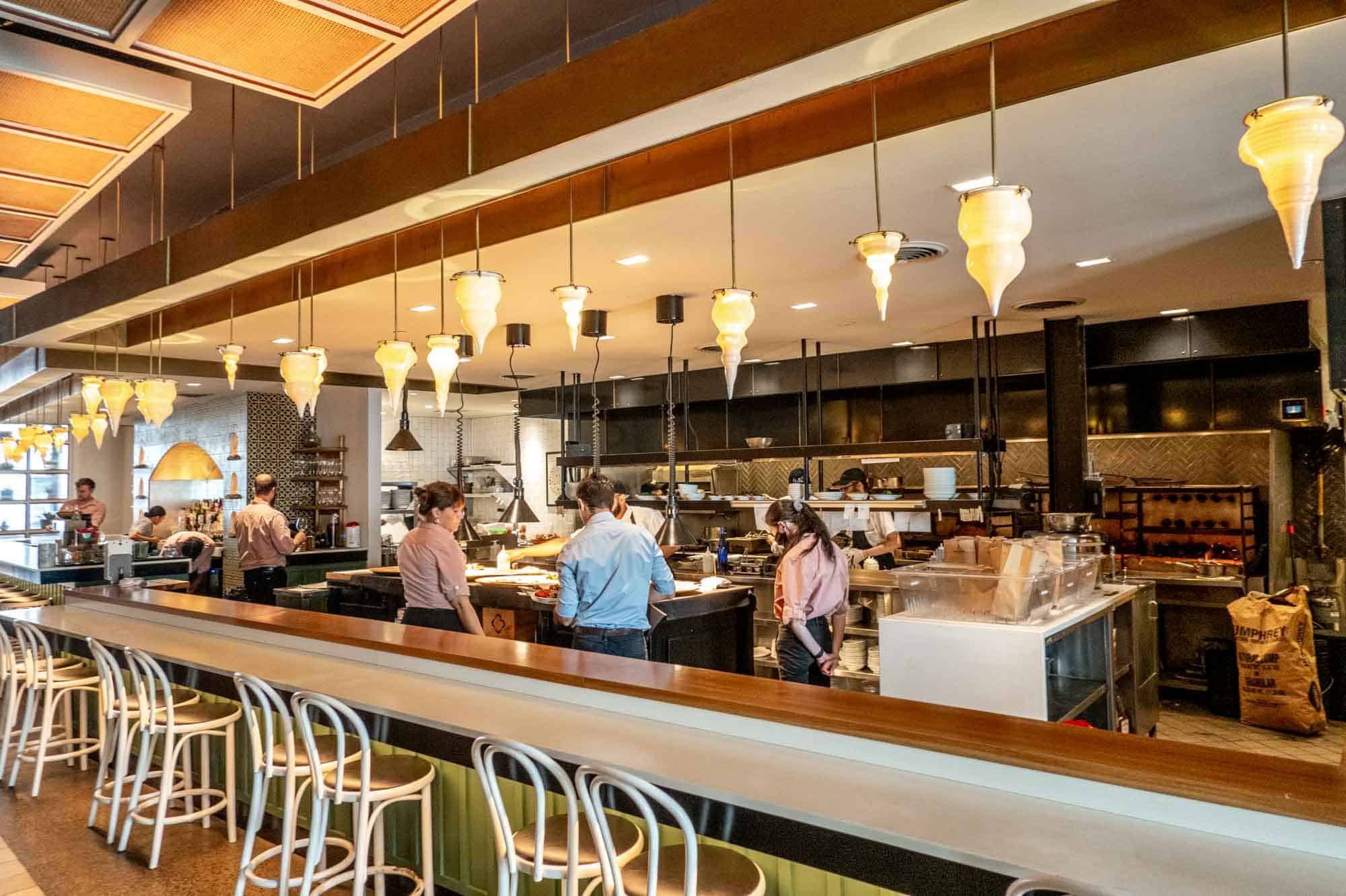 Employees in large open kitchen