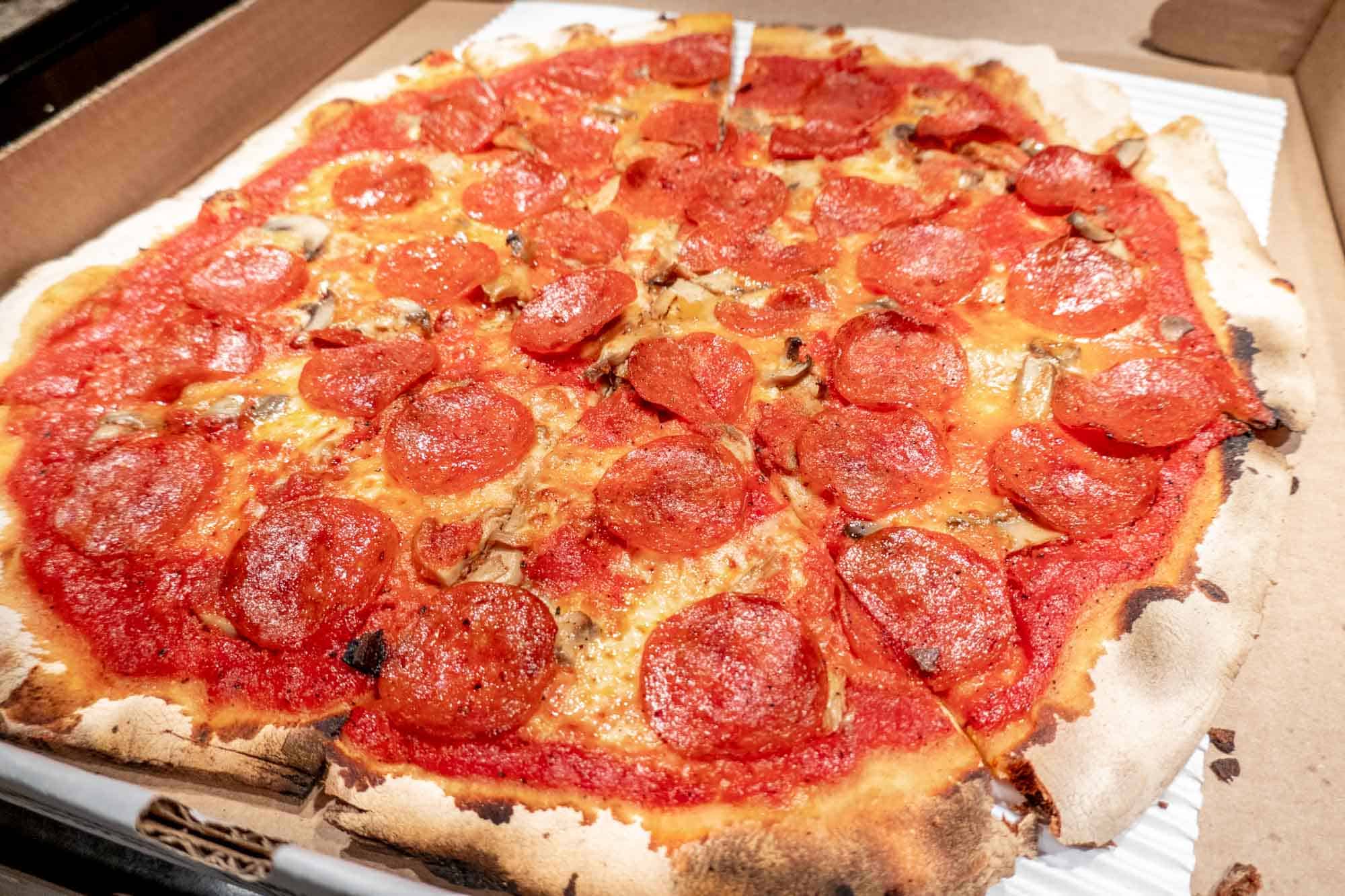 Pepperoni pizza with crunchy crust.