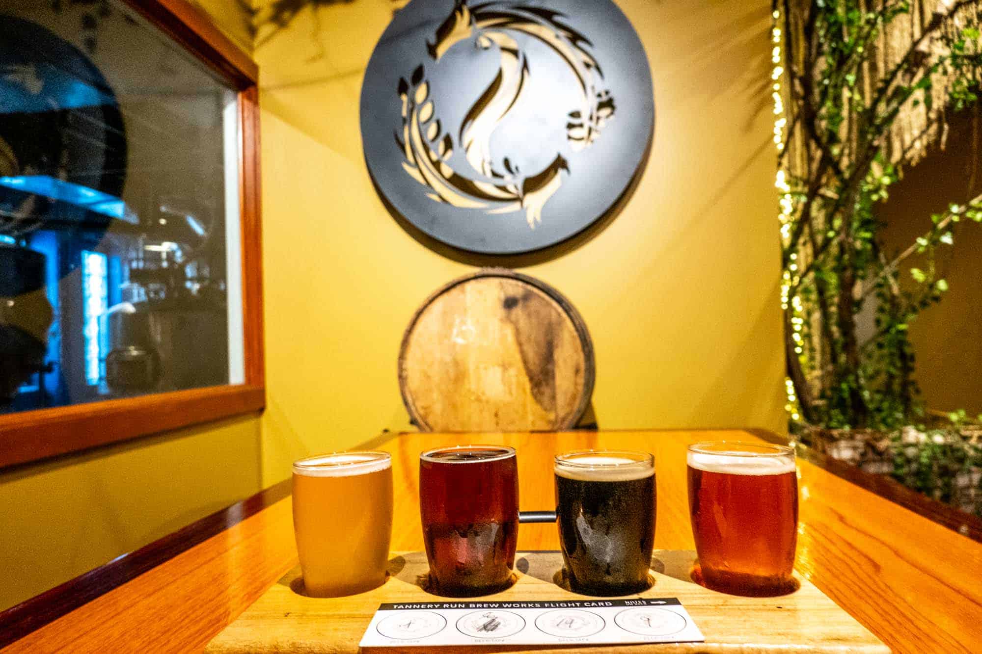 Flight of beers on a table at a brewery