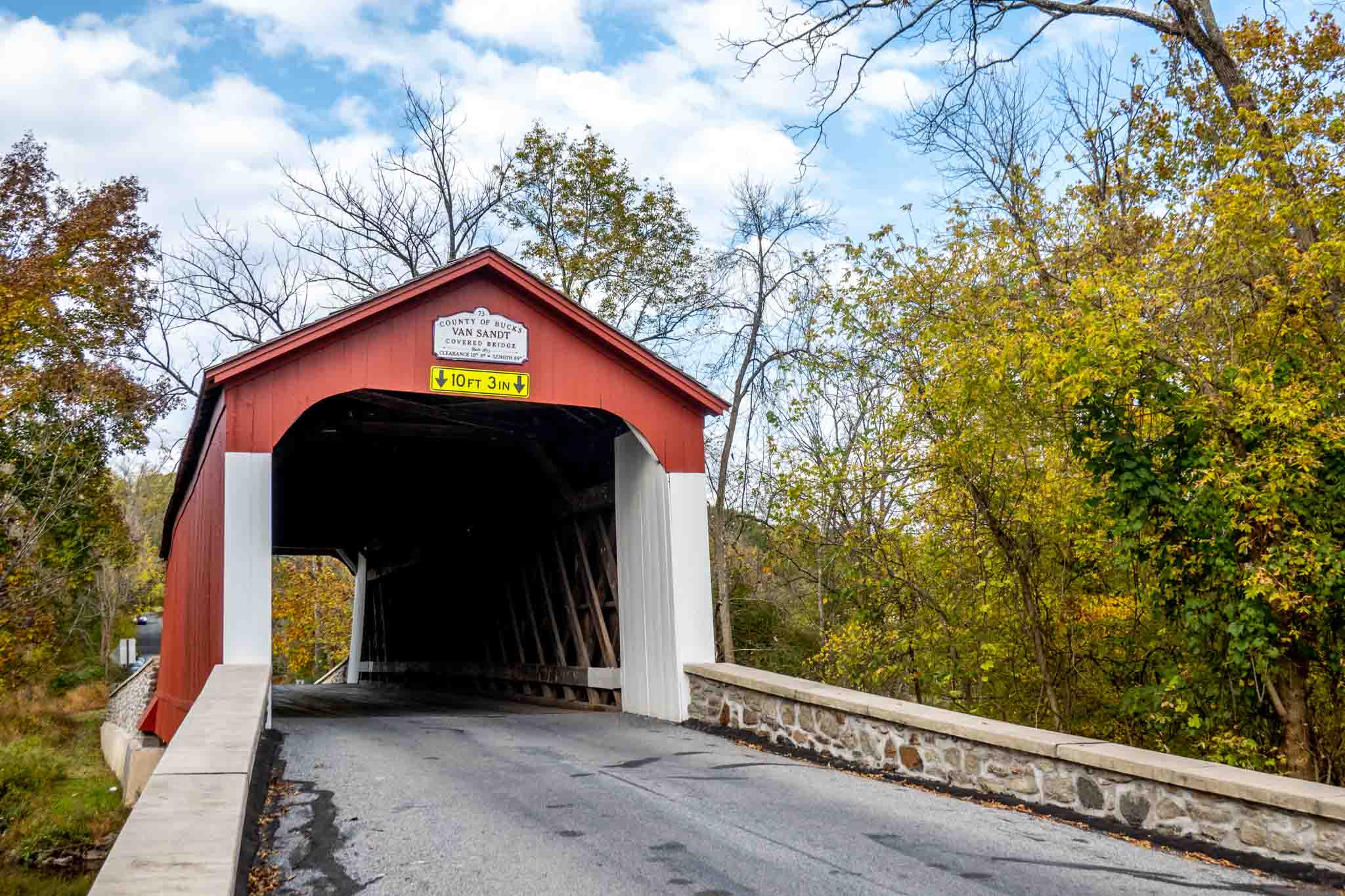 Red and white covered bridge.