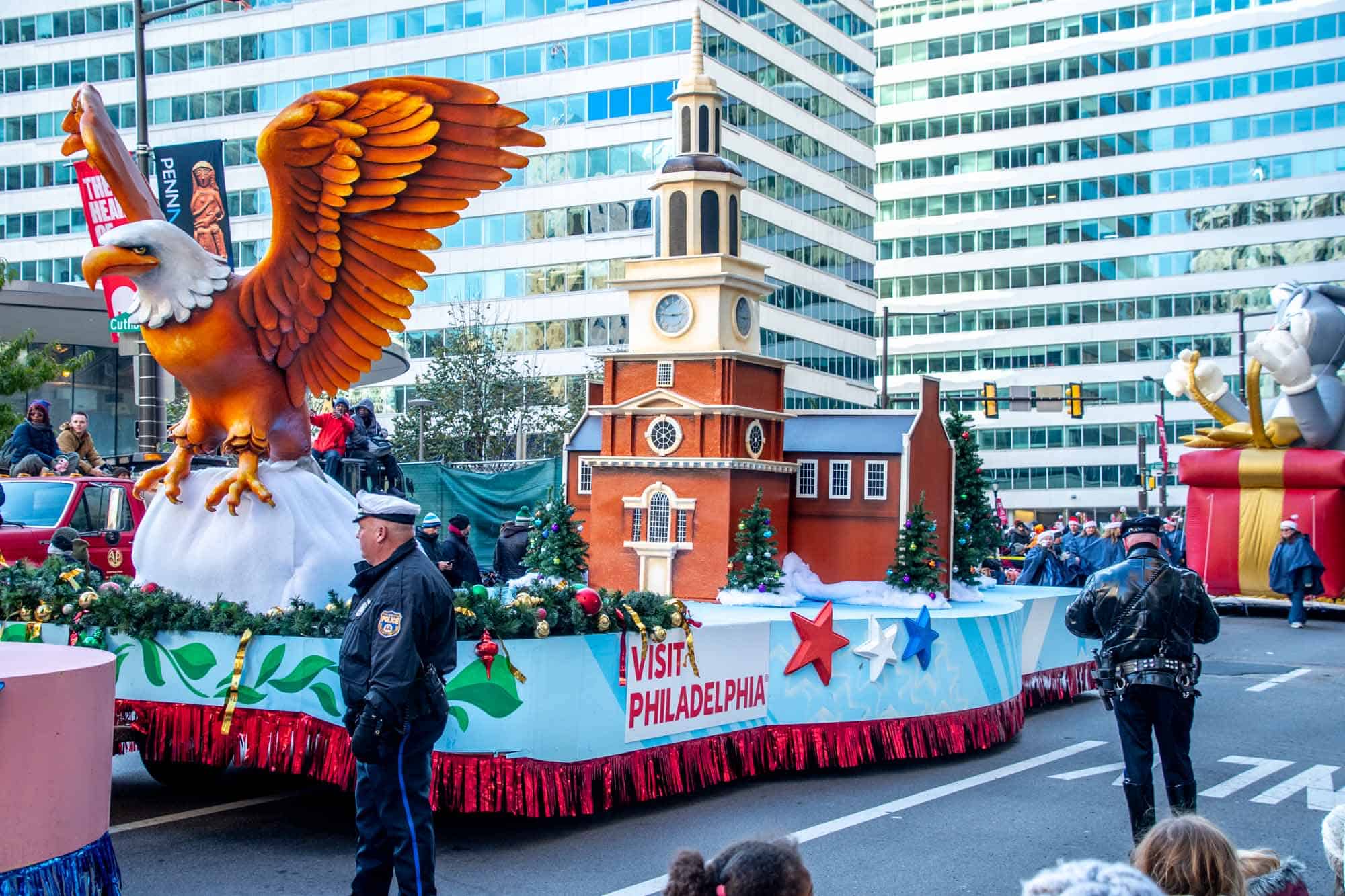 Float in parade with Philly Eagle and Independence Hall on it
