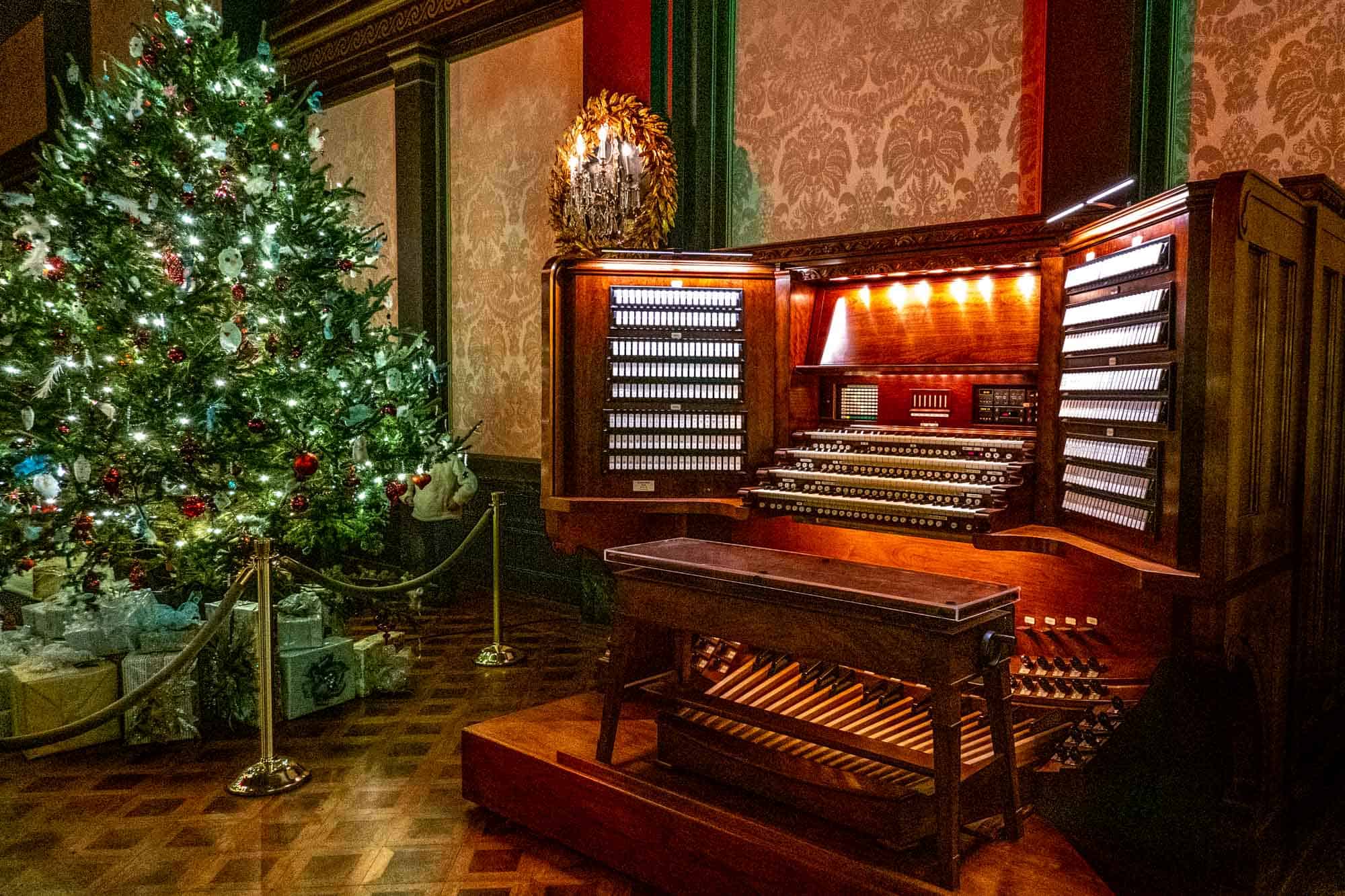 Christmas tree beside an organ